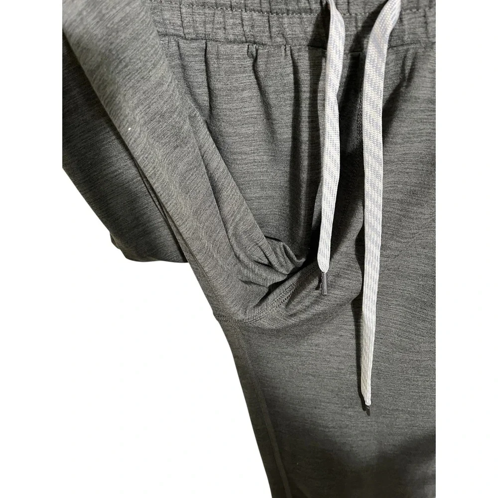 VUORI All Day Short Sleeve Jumpsuit in Heather Green VW424
